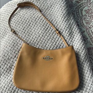 Coach Tan Leather Shoulder Bag with Classic Hobo Style